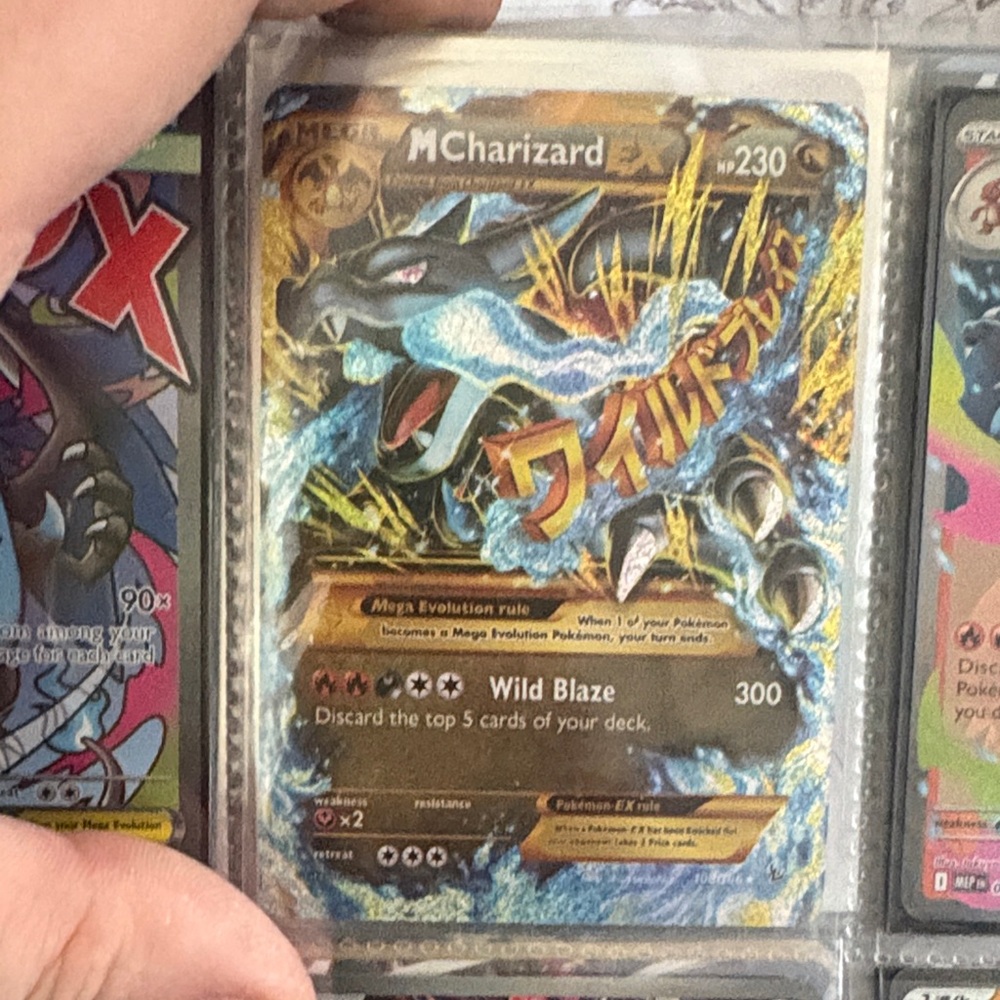 M Charizard EX Holo Card - Black & Gold Foil
